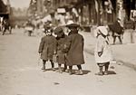 Children in warm clothes playing in New York 1909