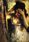 Woman combing her hair before a mirror Edgar Degas