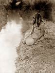 Maricopa Native American Indian woman at bank of a canal