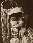 Apache girl and papoose - domestic Indian life