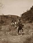 Apache land - Indians riding pack horses