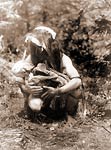 Kwakiutl Indian cradling mummy, 1911