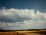 Farm and clouds color picture 1941