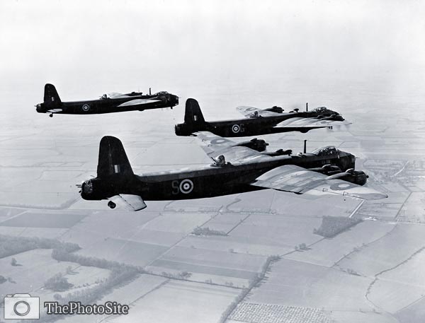 Three Stirling bombers taking off - Click Image to Close