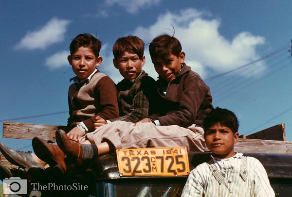 Boys sitting on truck, labor camp Robstown Texas 1942 - Click Image to Close