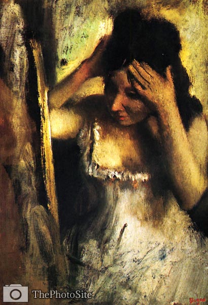 Woman combing her hair before a mirror Edgar Degas - Click Image to Close