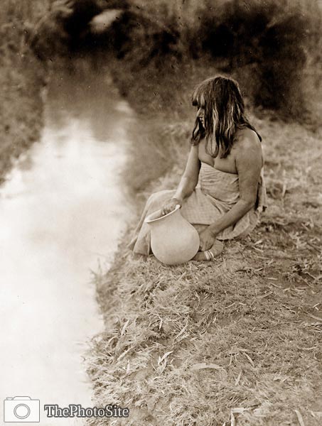 Maricopa Native American Indian woman at bank of a canal - Click Image to Close