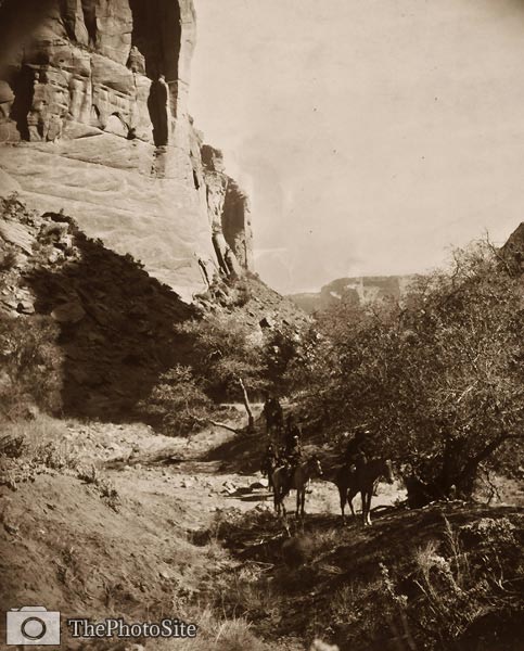 Several Navajo American Indian men at foot of canyon - Click Image to Close