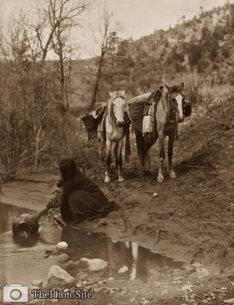 Getting water - Apache Indian with horses - Click Image to Close