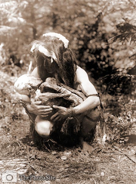 Kwakiutl Indian cradling mummy, 1911 - Click Image to Close