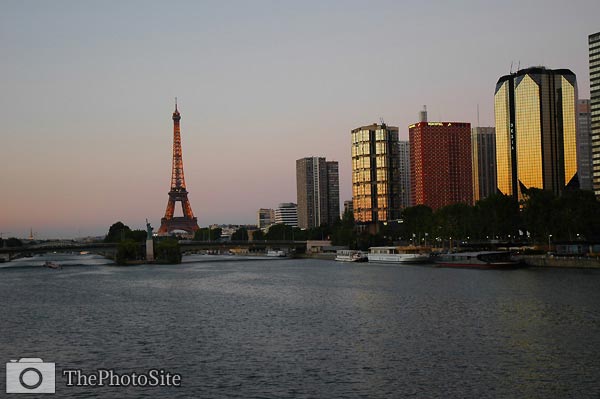 Eiffel Tower in evening, looking out across river Seine, Paris - Click Image to Close