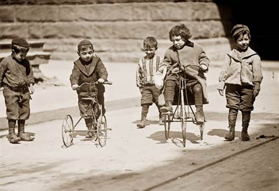 Children with tricycles, streets of New York 1909