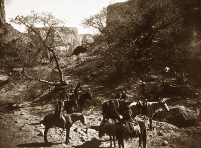 Group of Navajos in Tesakod Canyon on horseback