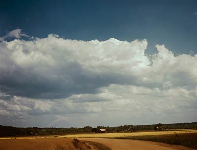 Farm and clouds color picture 1941