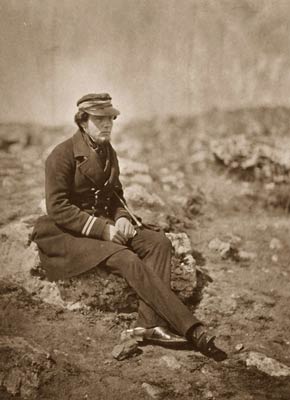 Commander Maxse seated on a rock, Crimean War