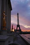 Eiffel tower with statues left