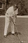 John McCormack playing golf